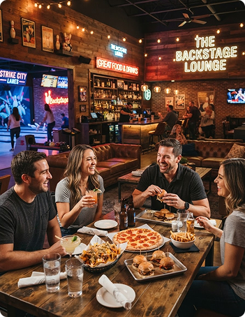 Guests relaxing in the Backstage Lounge with food and drinks